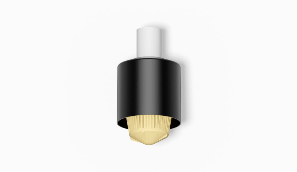 Schwarze Filterdüse mit gelber Spitze, die für verschiedene Anwendungen in der Filtertechnik verwendet wird.