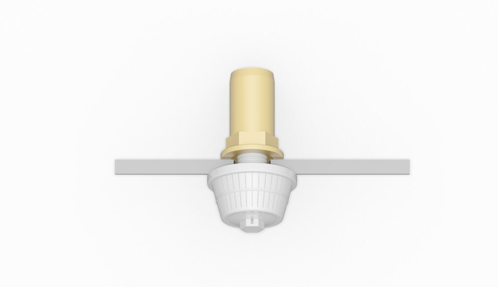 Montierte Filterdüse GVO-M24-o2 mit einem weißen Gehäuse und einem goldenen Anschluss.
