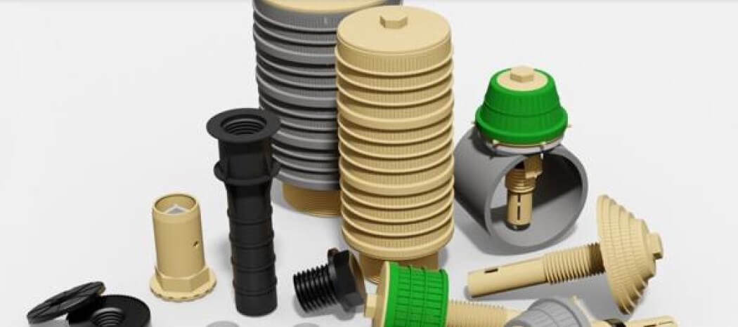 Eine Sammlung von Filterdüsen und Drainagekomponenten in verschiedenen Farben und Formen.