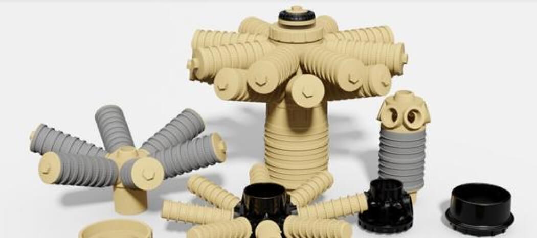 Verschiedene Filterdüsen und Komponenten eines Drainagesystems in unterschiedlichen Farben und Formen.