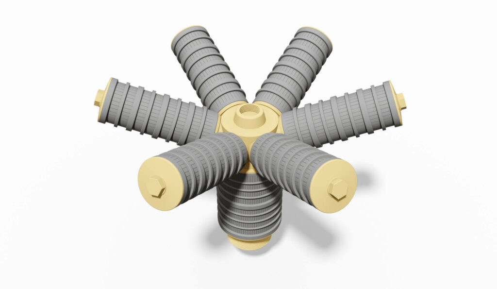 Mehrere Auslässe einer Filterdüse mit grauen und gelben Komponenten in einem symmetrischen Design.